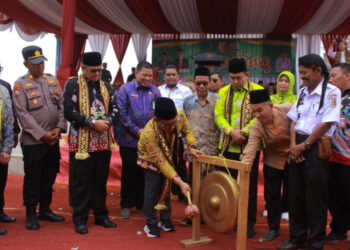 Hadiri Launcing Kampung Sadar Kerukunan, Pj. Bupati Tulang Bawang Perkenalkan Brand Andalan